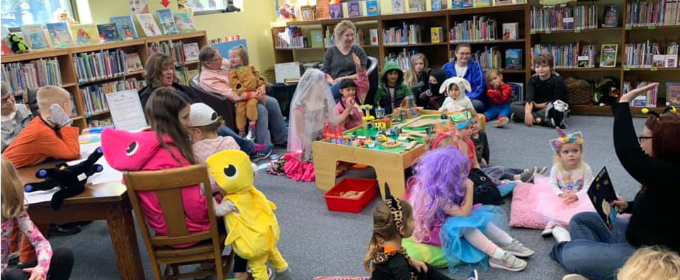 children's halloween story reading at the library